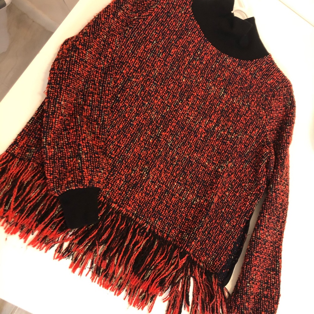 Tweed knit sweater with fringed bottom